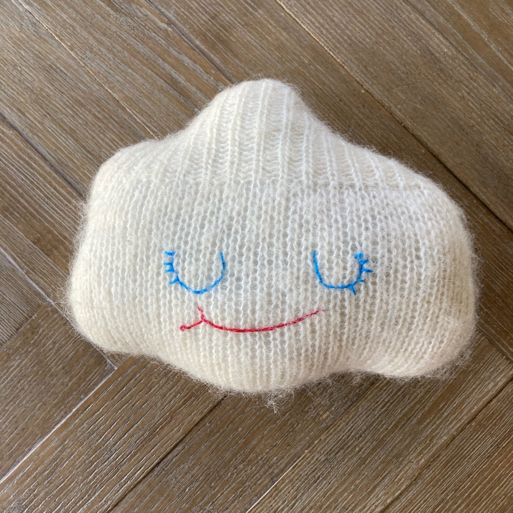 Small fuzzy knit cloud pillow for nursery
